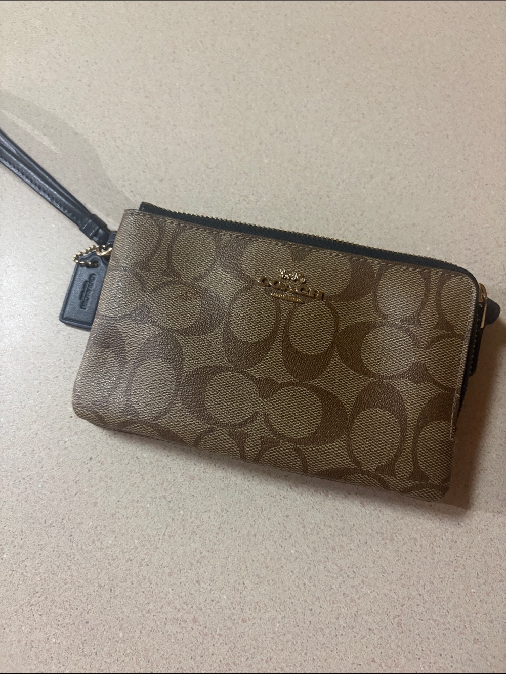 Coach Brown Signature Canvas double wallet Wristlet with dark blue Strap